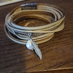 Elegant Silver and Cream Feather Charm Bracelet